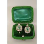 A good pair of 19th century emerald and diamond earrings, circa 1820, each emerald rubbed set in