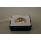 A 9ct gold diamond set signet ring, 7.3g all in.