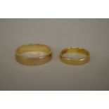 An 18ct gold wedding band, 3.3g; together with a 9ct gold example, 5.2g