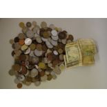 A quantity of 20th century World coins and banknotes.