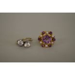 A 9ct white gold and platinum two stone white sapphire ring; together with a 9ct gold amethyst and