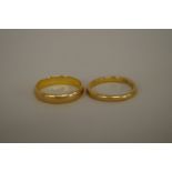 Two 22ct gold wedding bands, 6.9g.