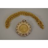 A Victoria 1880 gold sovereign, in an unmarked pendant mount; together with a 9ct gold chain, 11.5g.