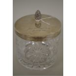 A silver lidded cut glass biscuit barrel, by A E Jones, Birmingham 1989, 13cm, 185g weighable.