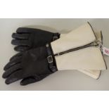 A pair of vintage black leather and faux cream leather motorcycle gauntlets, circa 1950s/60s.