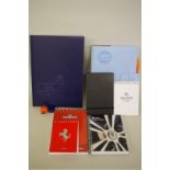 A collection of media notebooks and related, to include a pale blue leather Gulf example.