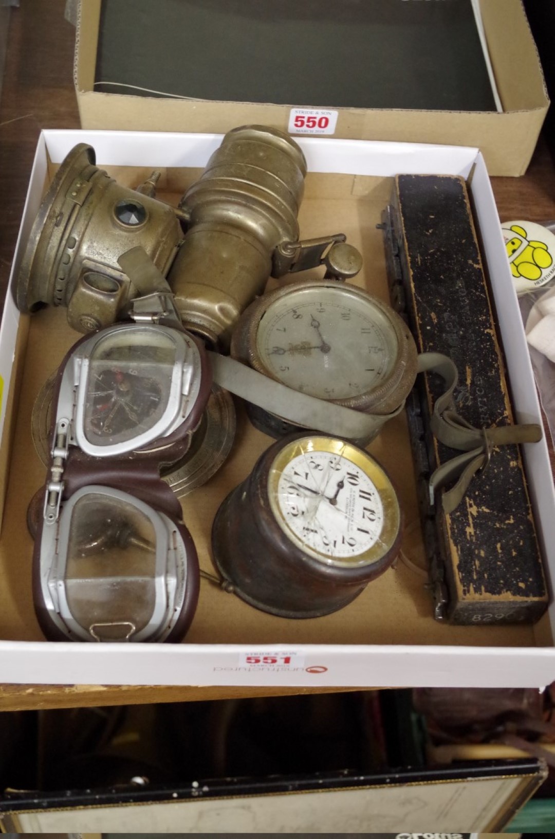 A mixed lot, to include: a Lucas 'Glacia Club' carbide lamp; two Smiths timepieces; goggles; etc. (