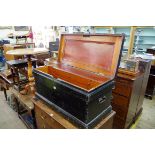 A Victorian black painted tool chest, the hinged top enclosing mahogany drawers. 92cm wide.