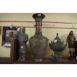 Three eastern items, comprising a large Japanese bronzed metal vase, 50.5cm high; a Burmese vase and