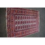 A Persian rug, with repeated design to central field with allover floral and geometric design, 180 x