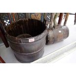 An antique iron bound staved wood bucket, 35cm high; together with a similar tub; and another