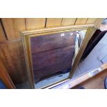 A modern gilt framed rectangular wall mirror, 106 x 71.5cm.