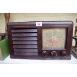 A vintage CEL Derwent brown Bakelite radio, 39cm wide.