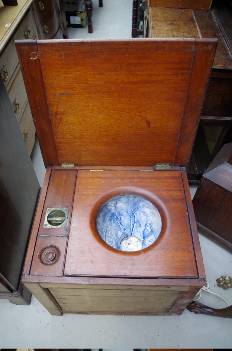 A late 19th/early 20th century mahogany campaign box commode, 60cm wide.