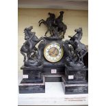 A Victorian slate and spelter Marley horse clock garniture, the clock 43cm high.