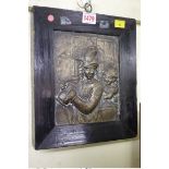 A relief cast brass plaque of two figures in a tavern, 19 x 15.5cm
