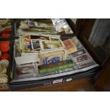 A collection of postcards, cigarette cards, silks and related; together with a tartan ware