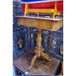 A 19th century Continental fruitwood tripod occasional table, with frieze drawer, 58cm wide.