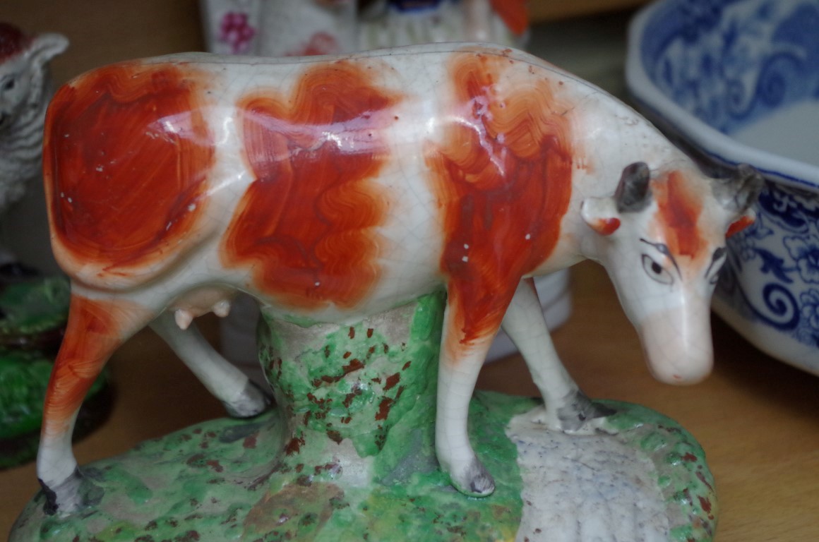 A small group of pottery, to include three Staffordshire figures. - Image 3 of 6