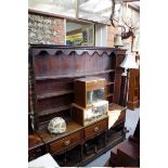 A George III oak pot board dresser and rack, 173cm wide.