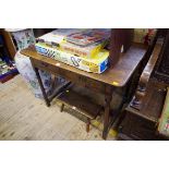 An antique oak two drawer side table, 97cm wide.