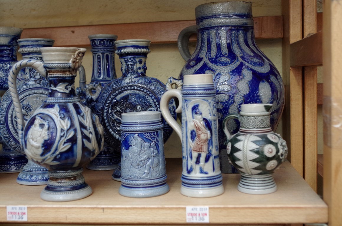 A collection of German salt glazed pottery jugs and vases, largest 37.5cm high. (2 shelves) - Image 4 of 6