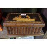 A Sorrento ware inlaid puzzle box, 23cm wide.