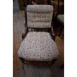 A Victorian walnut and button upholstered hall chair.