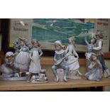 Six various Lladro figures, each with some damage and repair, largest 31cm.