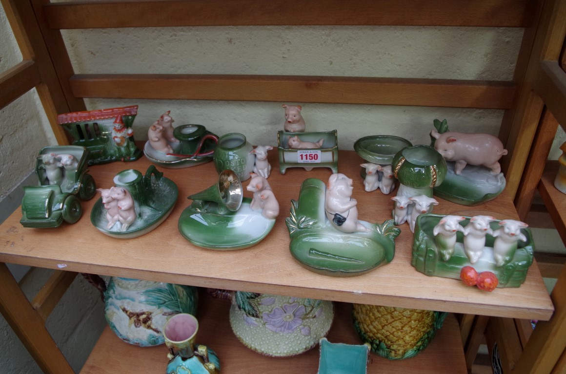 Twelve Continental porcelain pig fairings.
