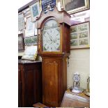 An early 19th century oak, mahogany and inlaid eight day longcase clock, with 14in painted arched