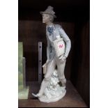 A Lladro figure, 36cm high.