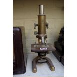 A brass monocular microscope by Prior, No.11765.