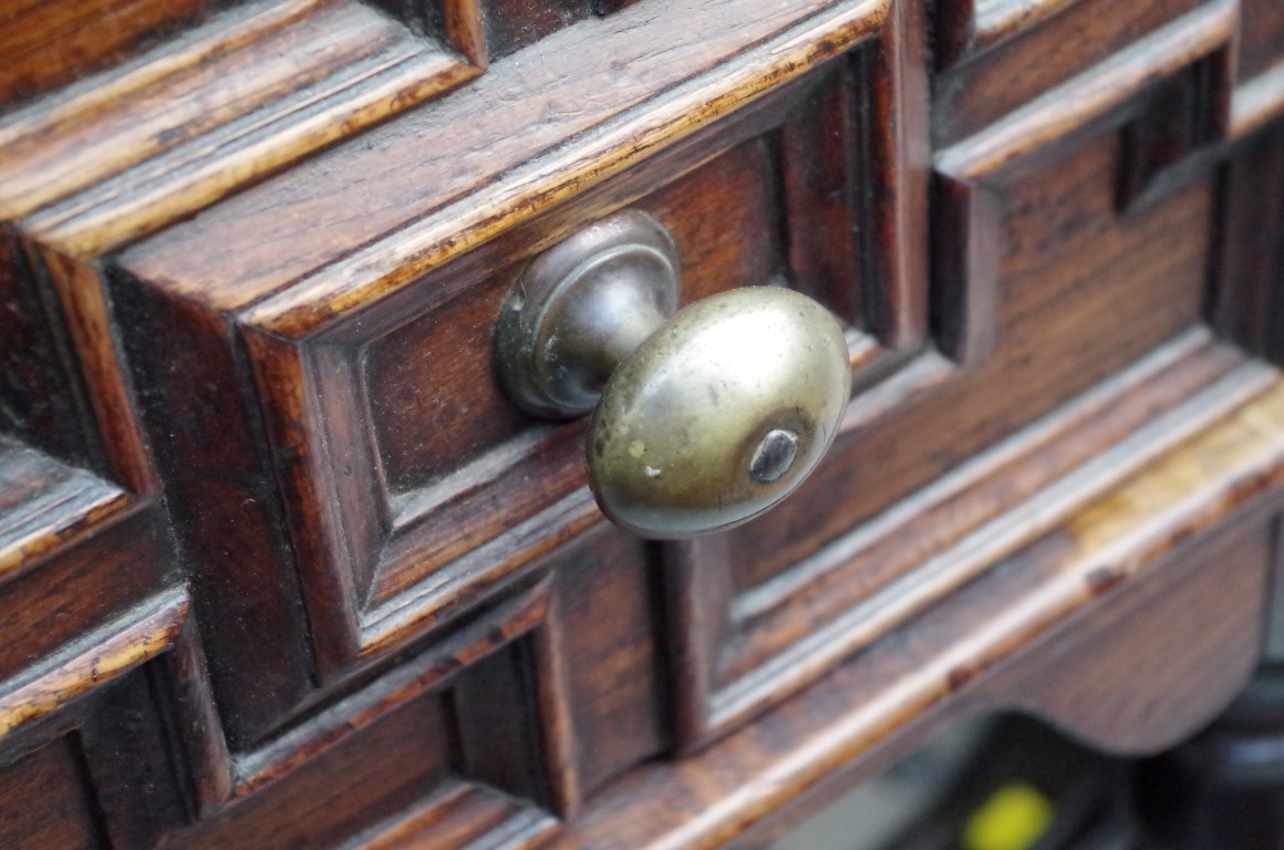 An 18th century oak dresser base, with geometrically moulded frieze drawers above reel turned legs - Image 5 of 6