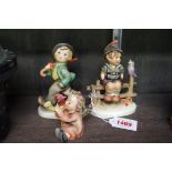 Three Hummel figures, to include 'Strolling Along'.