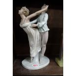 A Nao porcelain figure group of a dancing couple, 31.5cm high.