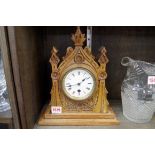 A Continental carved walnut architectural timepiece, 29cm high.