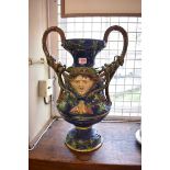 A large late 19th century French majolica Palissy ware twin handled Medusa vase, by Victor Barbizet,
