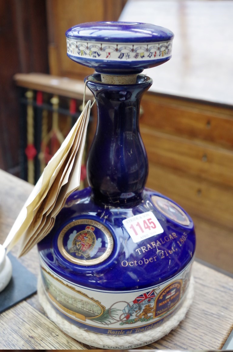 A Pusser's navy rum decanter and stopper, (no contents).