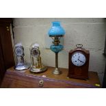 An Edwardian mahogany and inlaid dome top mantel clock, height including handle 28cm, with pendulum;