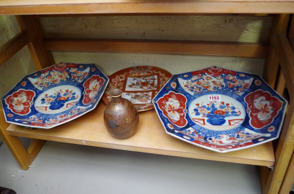 A pair of Japanese Imari hexagonal plates, 30.5cm wide; (both repaired); together with a Kutani