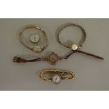 Four 9ct gold ladies wristwatches. three having replacement expanding plated bracelets, one having