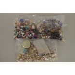 A small selection of silver and costume jewellery; together with a quantity of loose pearls and