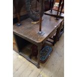 An antique oak two drawer side table, 97cm wide.