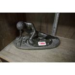 After the antique a serpentine figure of The Dying Gaul, 20.5cm wide.