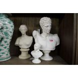 Two composition classical busts, largest 30cm high; together with another small pottery bust of Lord