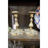 A pair of antique gilt bronze rococo style candlestick form lamps, 20cm high.