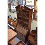 An antique mahogany bureau bookcase, 93cm wide.