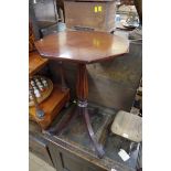 A pair of mahogany octagonal tripod tables, with reeded columns, 44.5cm wide.