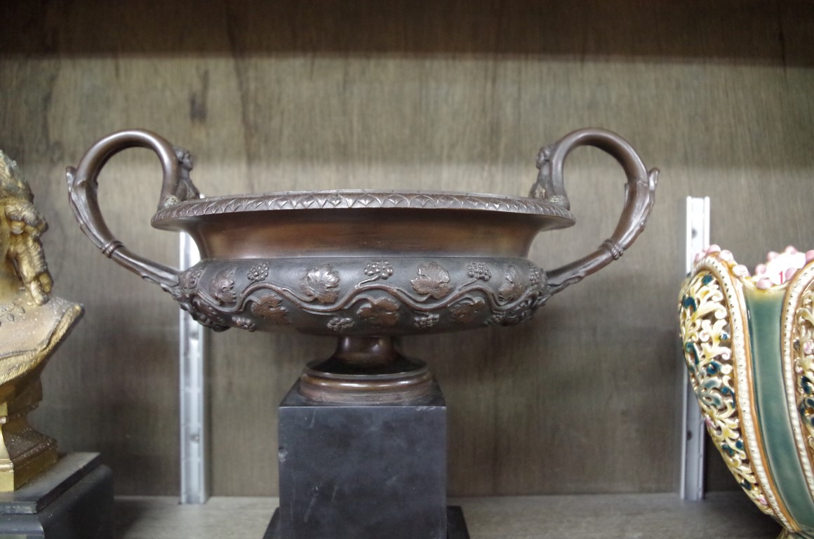 A 19th century bronze twin handled campana urn, on slate base, 32cm wide. - Image 3 of 4